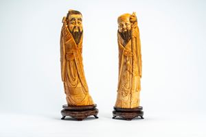 ☼ Pair of ivory figures of sages, one holding a staff and the other a musical instrument, China, early 20th century