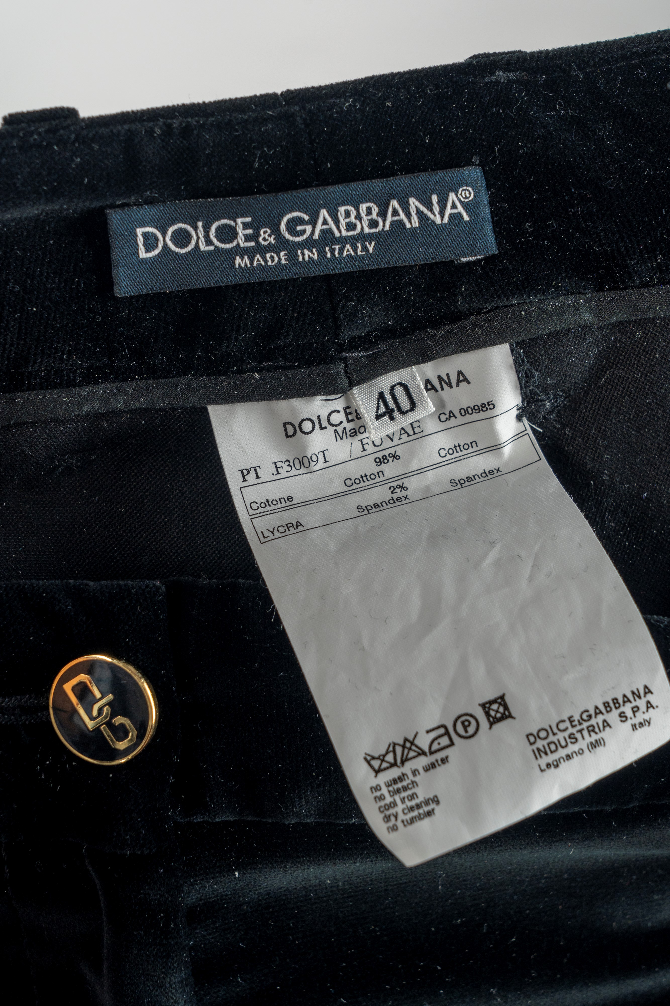 Dolce & Gabbana - Pantalone in velluto nero con bottoni dorati