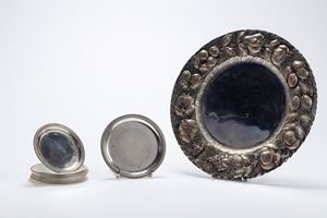 Lotto di nove complementi da tavola