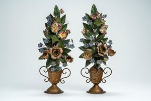 Pair of polychrome metal and iron palm stands, in the form of two-handled vases with leaves and flowers, 19th century.