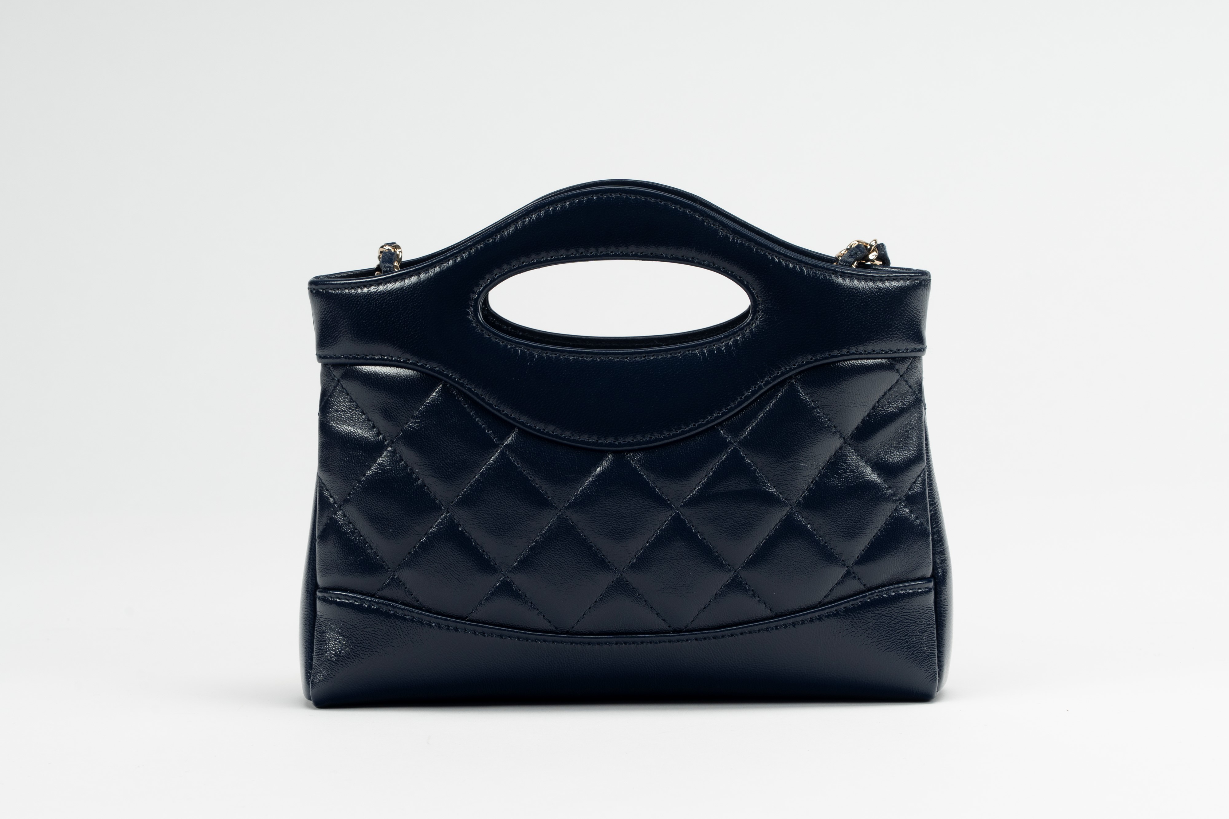 Chanel - Mini Borsa in pelle matelassé blu navy con tracolla a catena