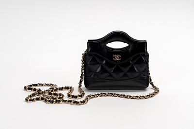 Mini borsa in pelle matelassé nera con tracolla a catena