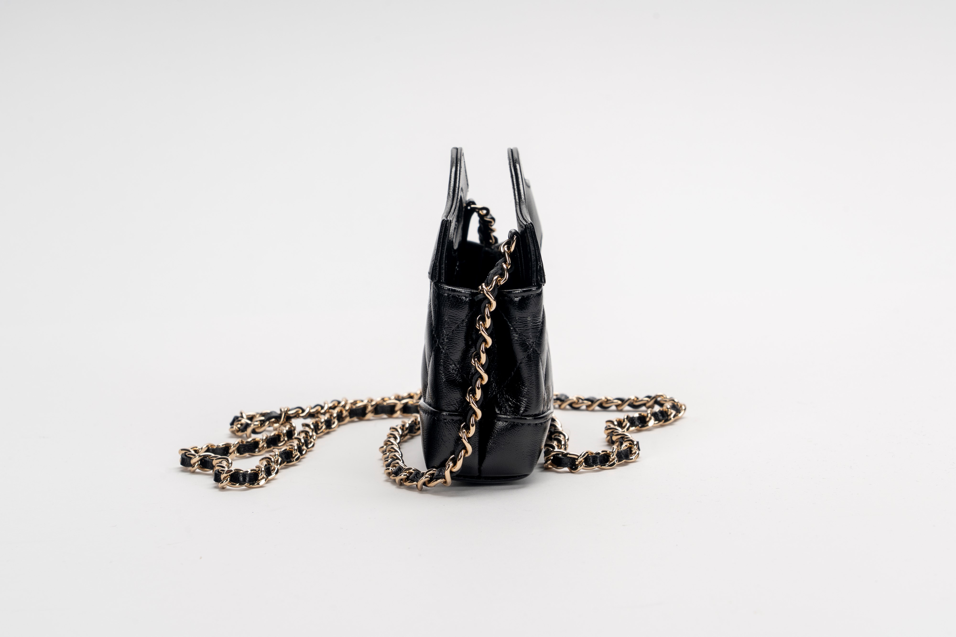 Chanel - Mini borsa in pelle matelassé nera con tracolla a catena