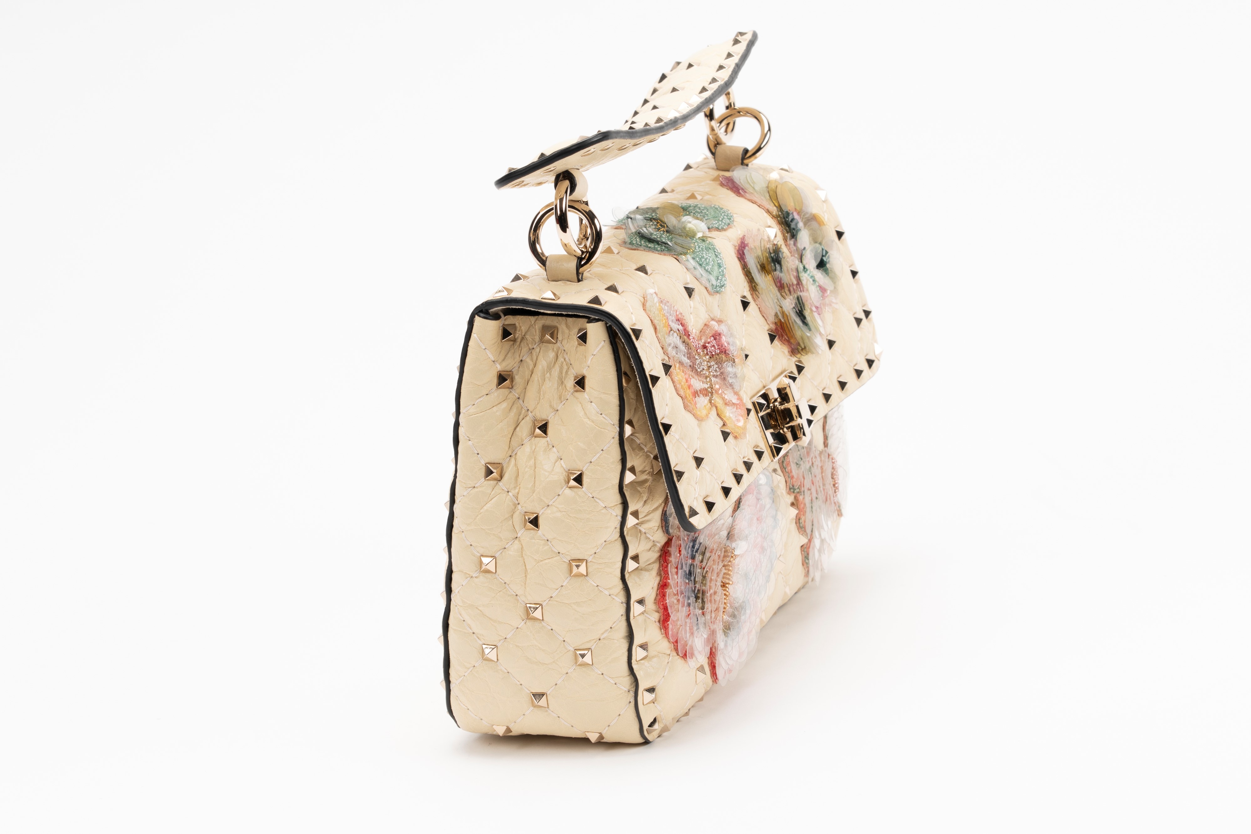 Valentino Garavani - Borsa Rockstud in pelle color crema con applicazioni ricamate