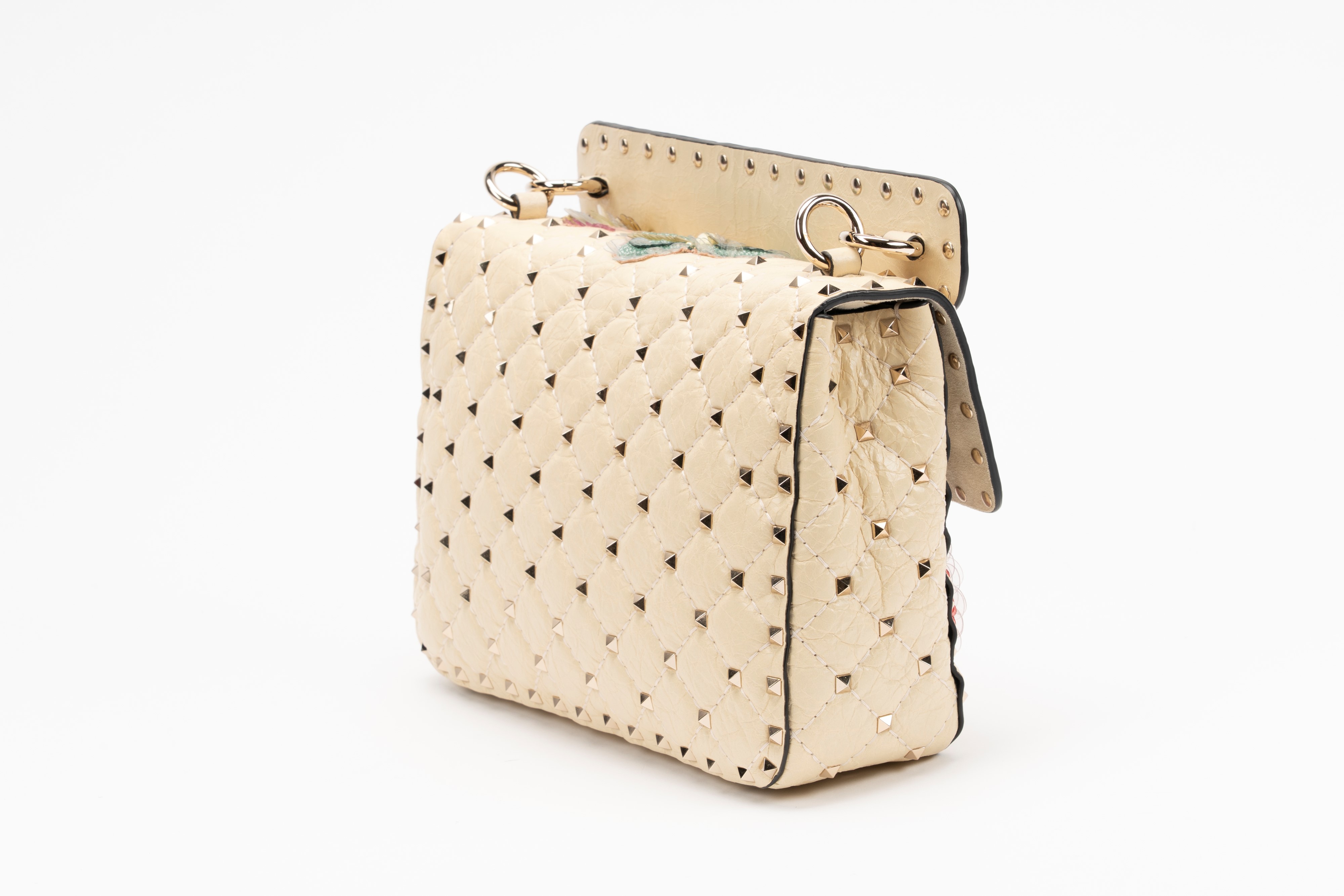 Valentino Garavani - Borsa Rockstud in pelle color crema con applicazioni ricamate