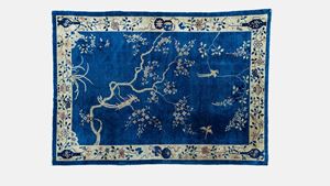 Beijing carpet with blue ground, flowering branch and bird