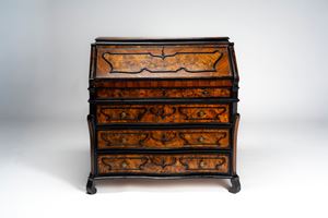 Antique walnut and walnut burr fall-front chest of drawers with three drawers, one half-drawer, and a fall-front concealing six small drawers. Decorated with shaped panels outlined in ebonized wood, on scroll feet