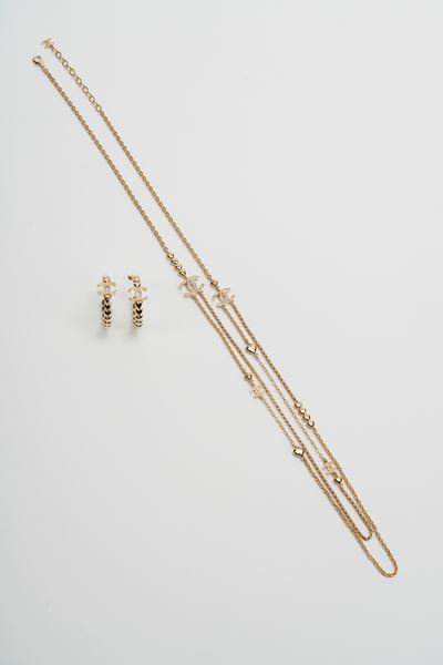 Demi parure, collana in metallo dorato e strass con orecchini in pendant