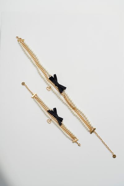 Demi parure in metallo dorato e perle fancy