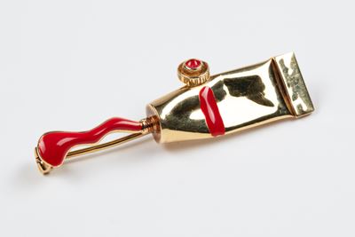 Spilla-pendente tubetto in oro giallo 18k