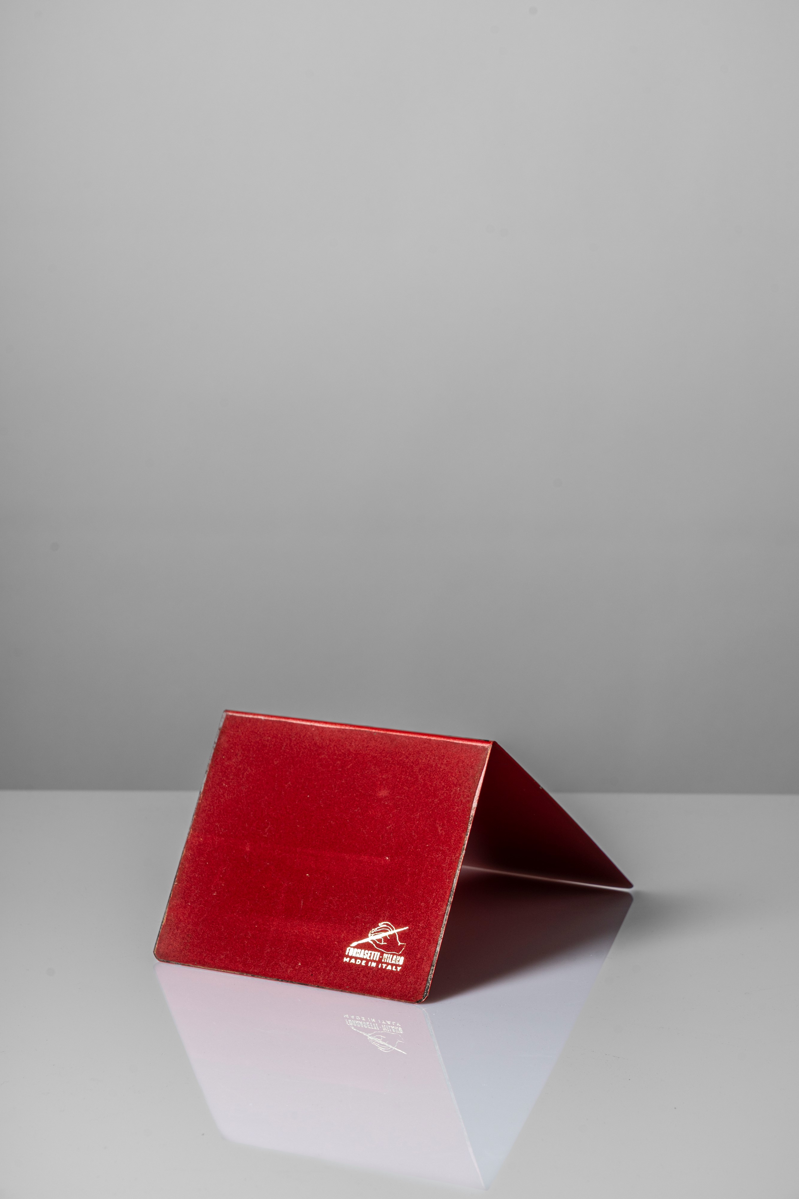 Set di quattro fermalibri, decoro 'strumenti musicali'