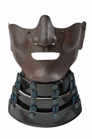 A Ryubu Menpo with rusty surface