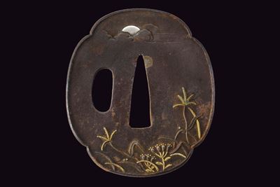 Tsuba giapponese, Mokko-gata in ferro con decorazioni in oro e argento