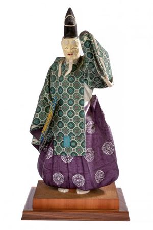 A wooden "Okina" Noh sculpture