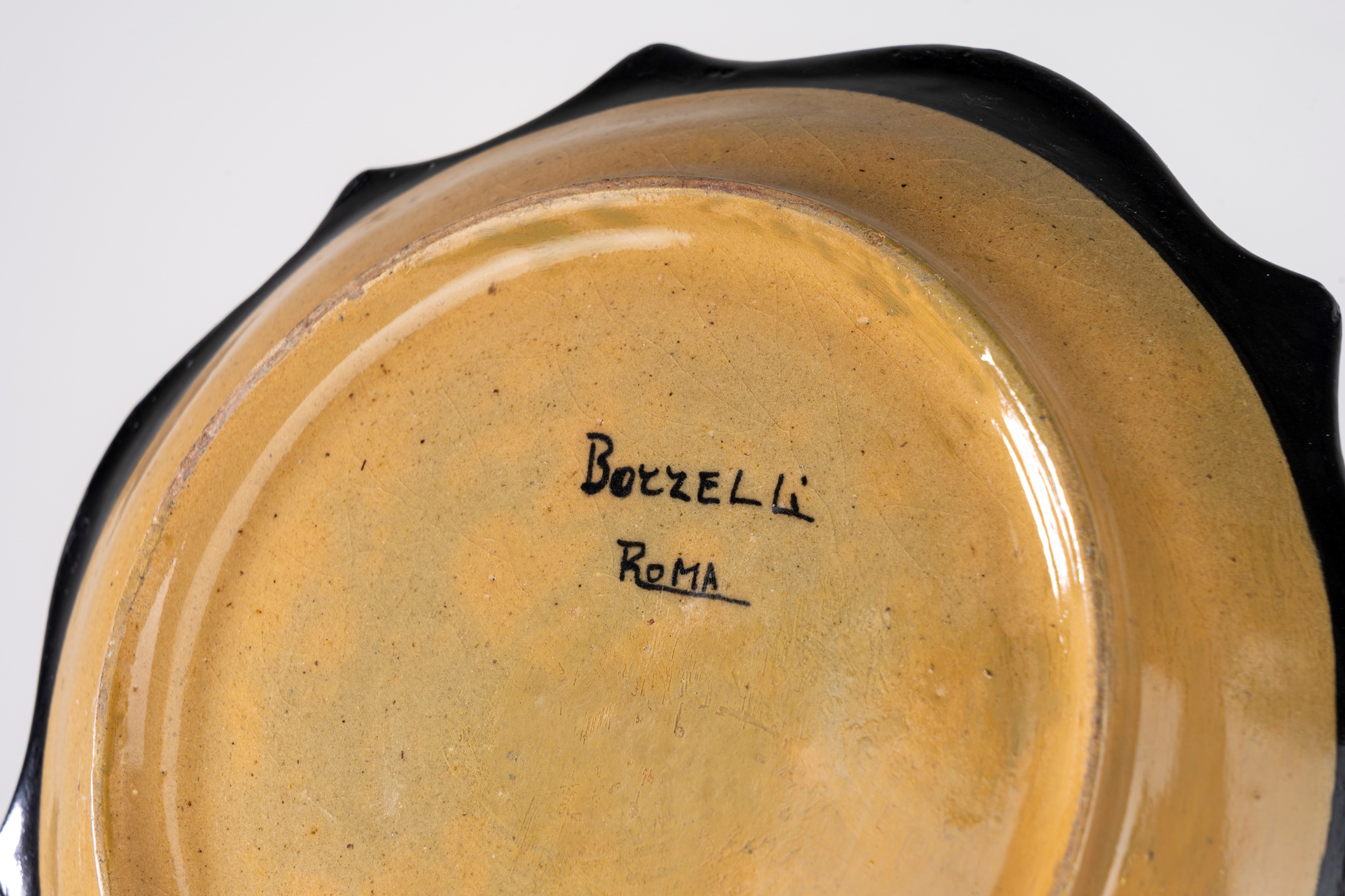 Borzelli, Piatto in ceramica decorato con figura infantile, Roma, anni '30 del Novecento