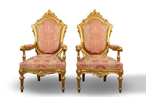 Coppia di poltrone in legno intagliato e dorato, secolo XIX