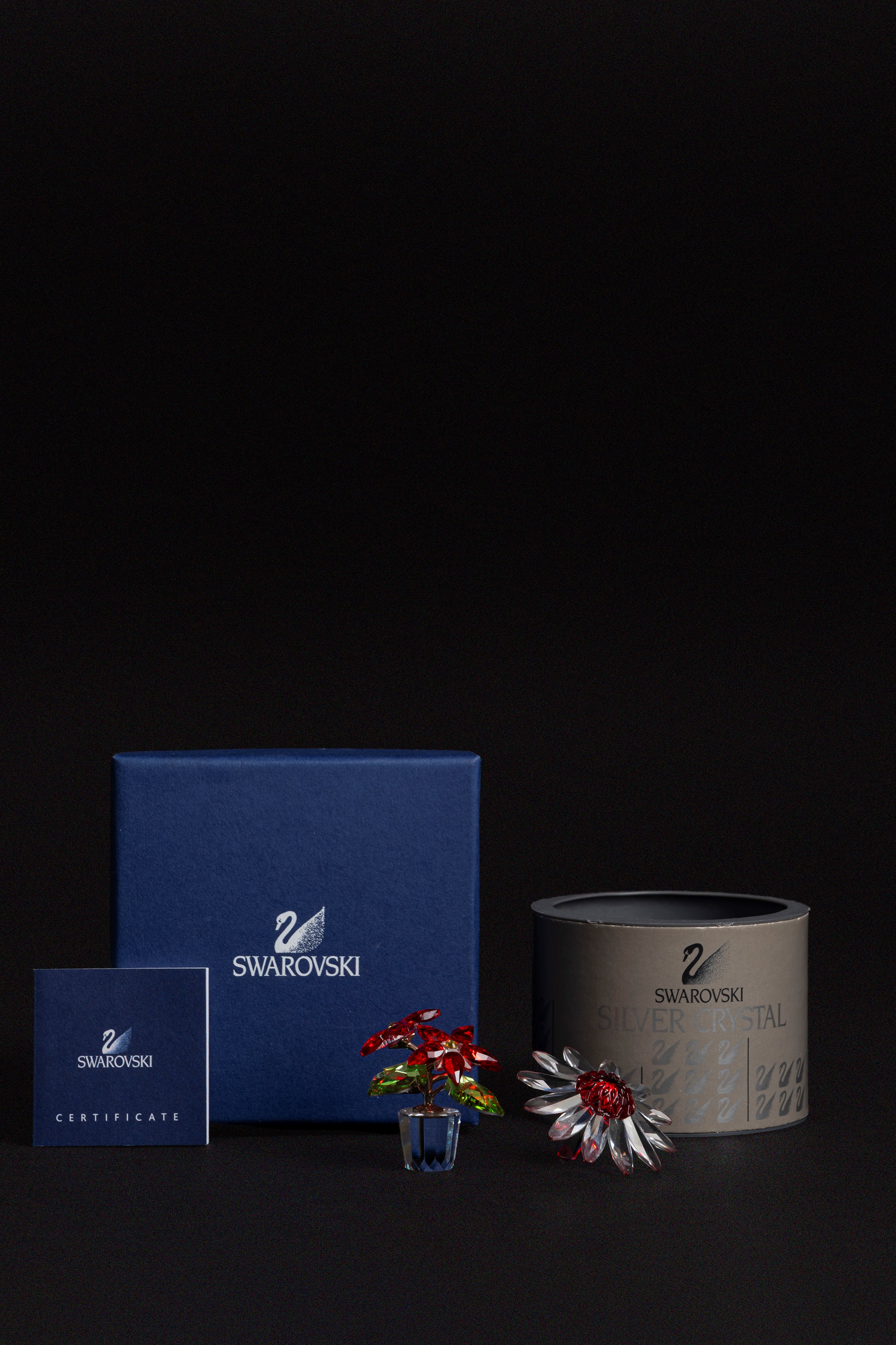 Swarovski - Piccole composizioni floreali in cristallo: Poinsettia e Marguerite rossa