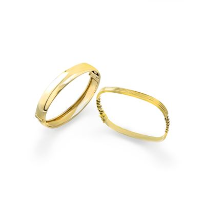 Bracciali in oro giallo 18k, one rigido e uno a catena