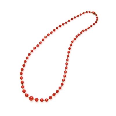 Collana sautoir in oro giallo 18k con corallo