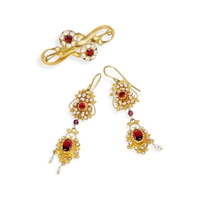 Demi-parure in oro giallo 18k con granati e perline