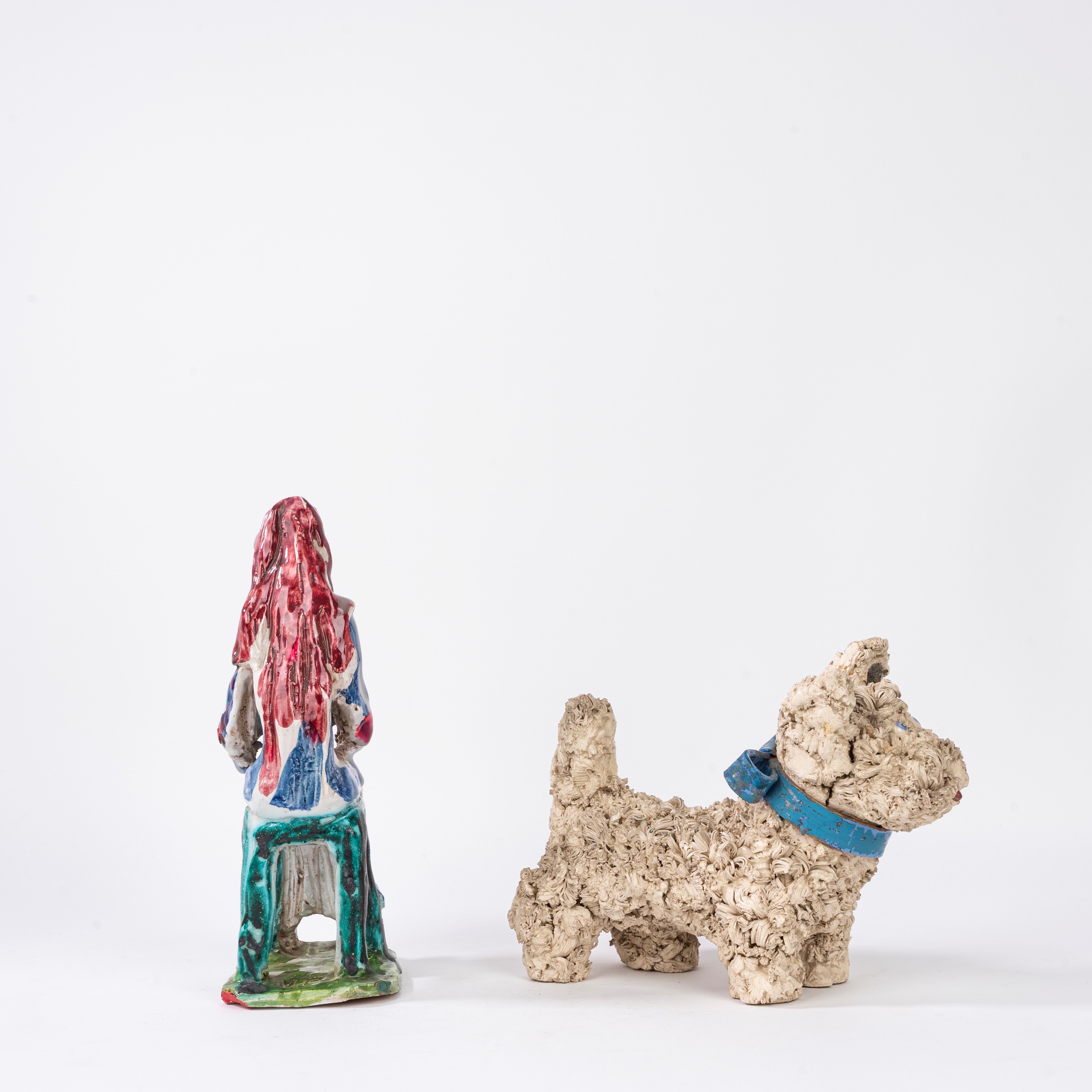 Sculture in maiolica: Madonna con Bambino e cane Fox Terrier