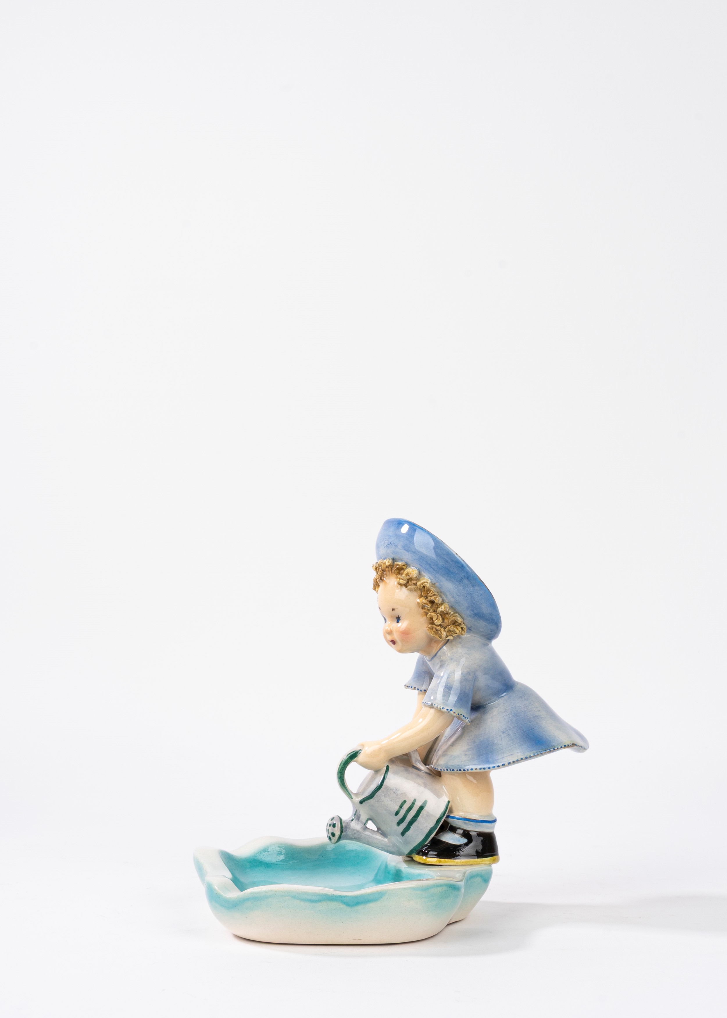 Marcello Comacchio, Scultura in ceramica raffigurante bimba con innaffiatoio