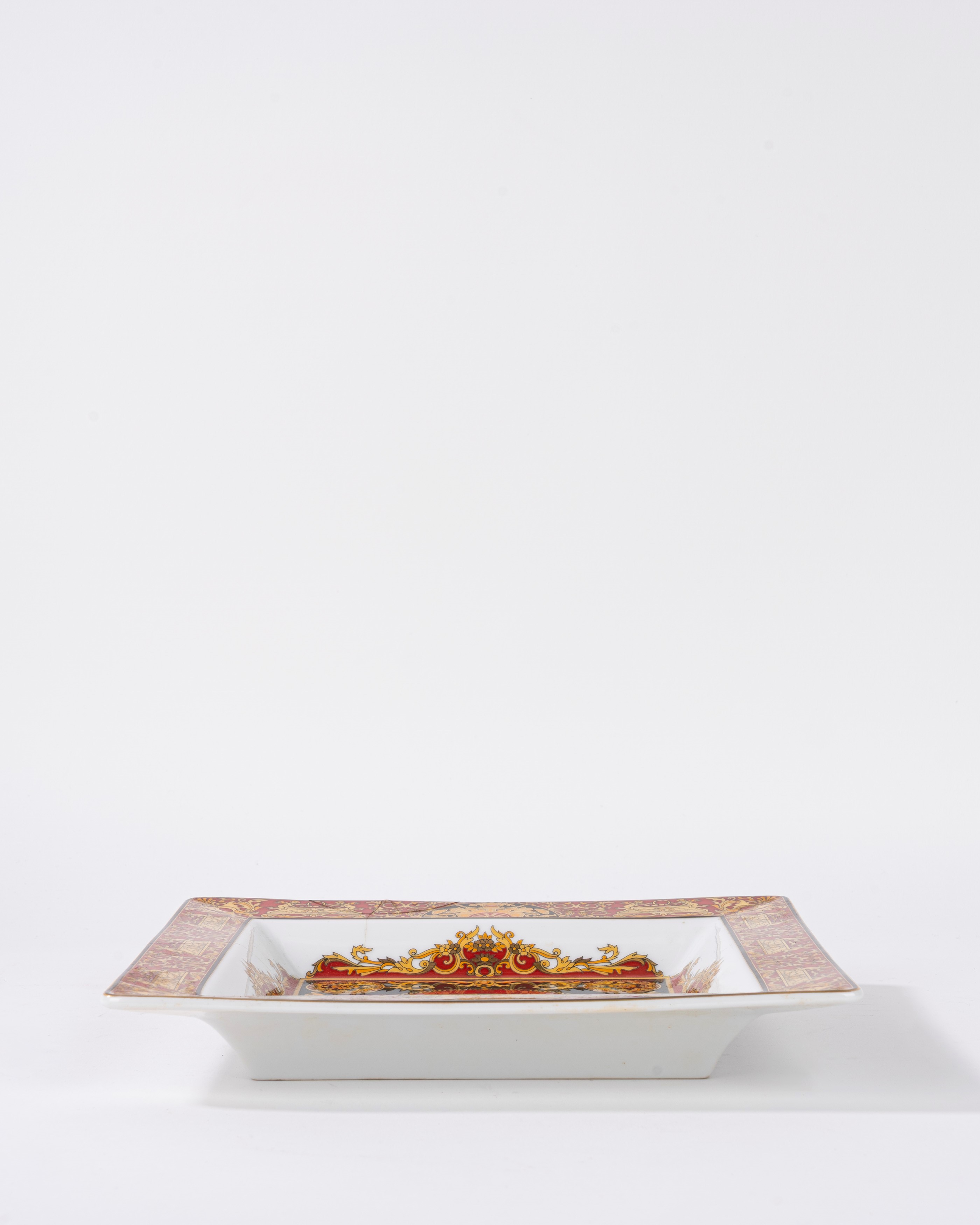 Piatto quadrato in porcellana policroma con medusa, Versace per Rosenthal