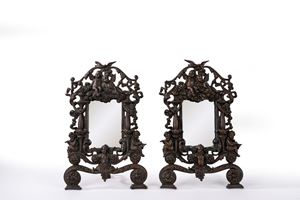 Coppia di cornici in bronzo con amorini e grottesche, secolo XIX