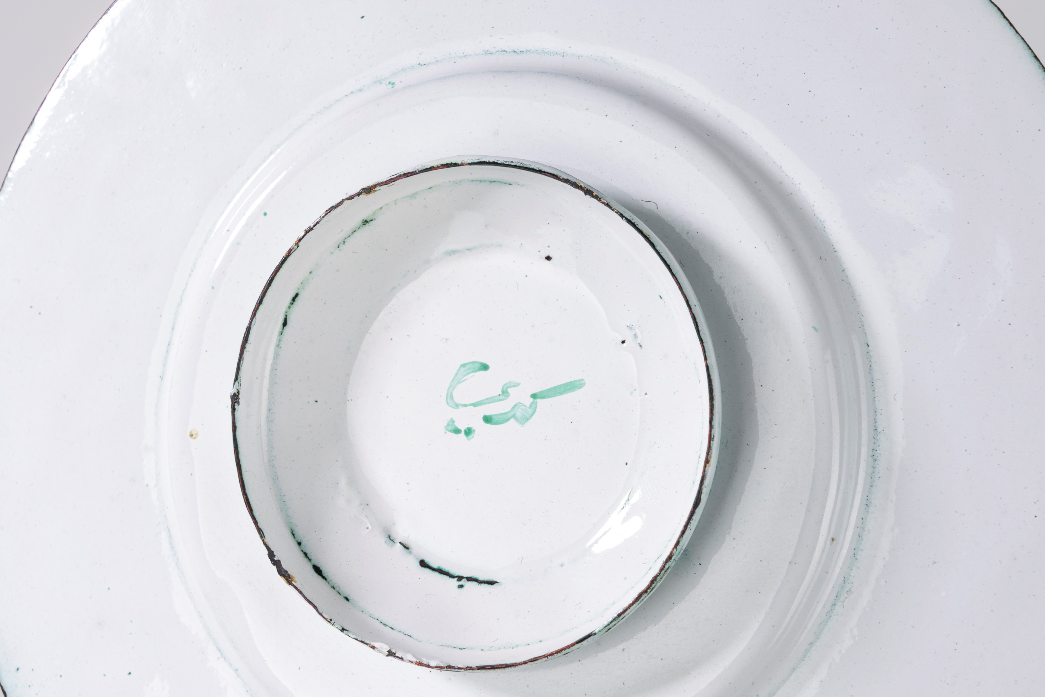 Ciotolina con piattino, latta smaltata verde, Turchia o Persia, inizi secolo XX