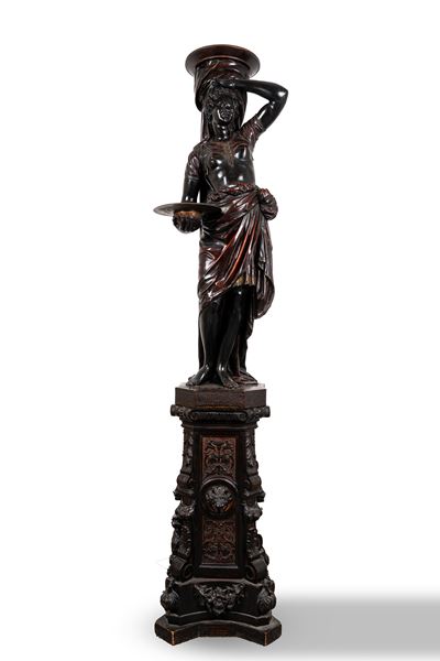 Grande scultura reggitorcia in legno ebanizzato raffigurante schiava moresca, secolo XIX