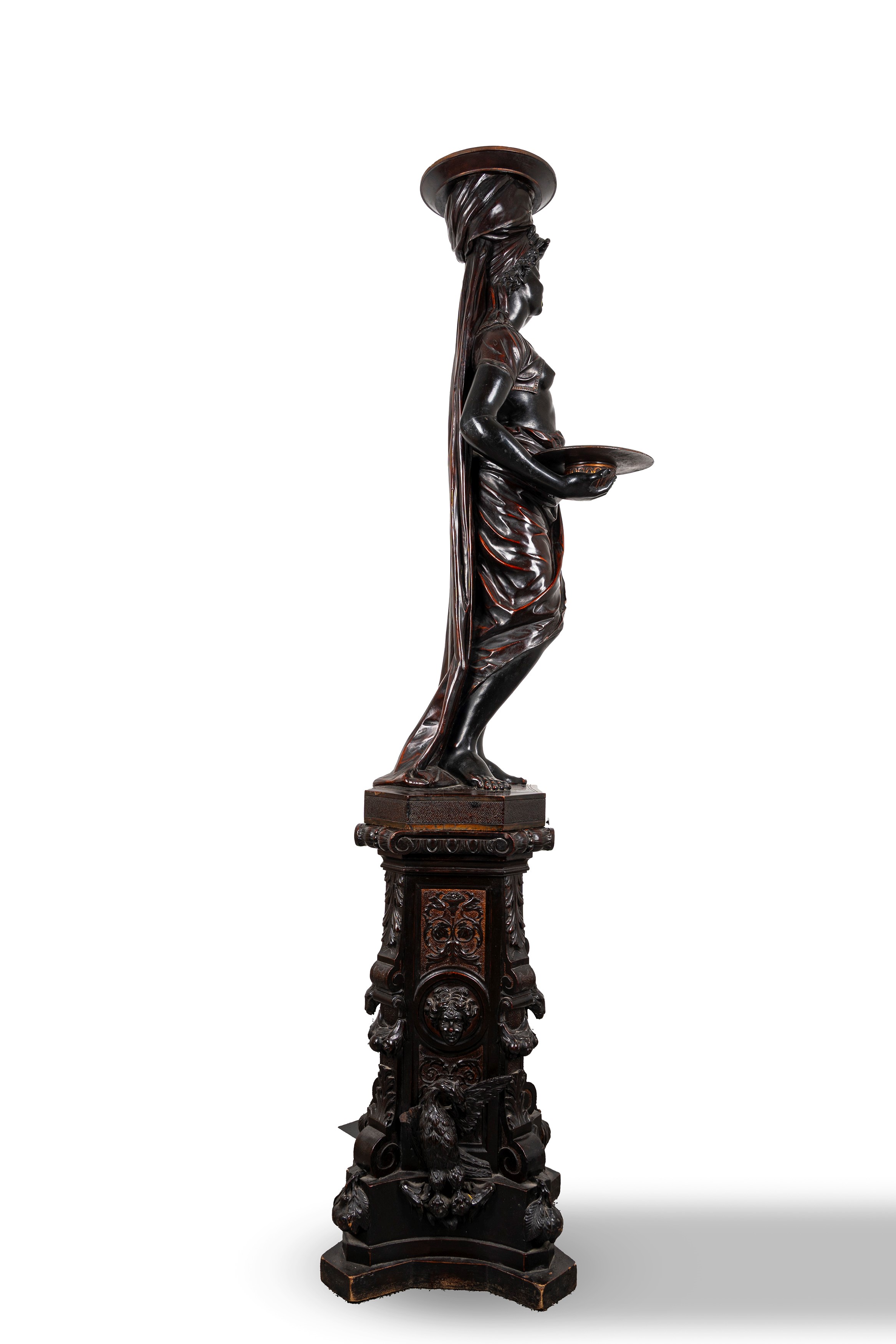 Grande scultura reggitorcia in legno ebanizzato raffigurante schiava moresca, secolo XIX