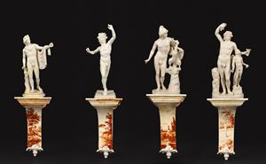 Quattro sculture in maiolica bianca, con base, secolo XIX