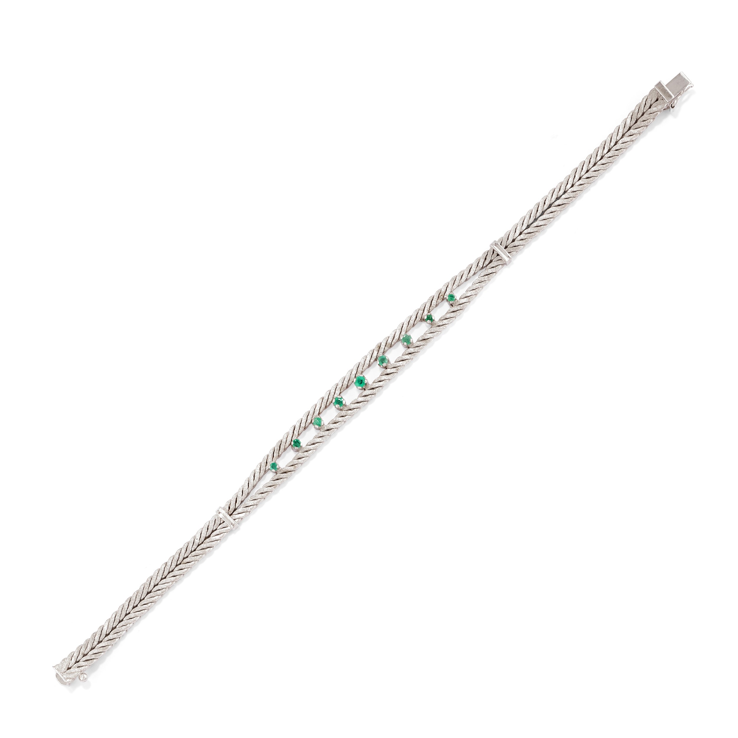 Tre bracciali in oro bianco 18k con rubini e smeraldi