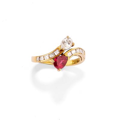 Anello a contrarié in oro giallo 18k con diamante e rubino