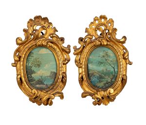 Coppia di cornici ovali in legno intagliato e dorato, secolo XIX