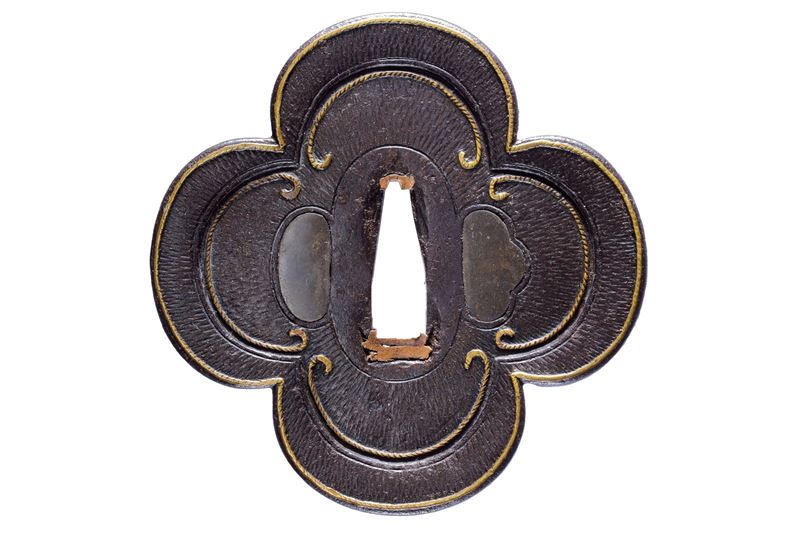 Interessante tsuba della scuola Heianjo