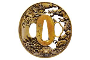 Tsuba firmata Baigetsu saku