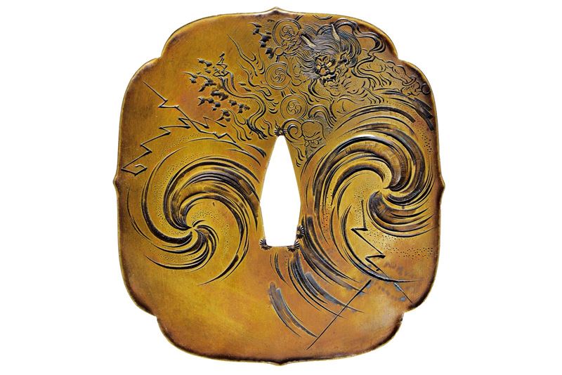 Tsuba firmata Somin, con kao
