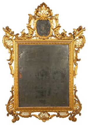 Grande specchiera in legno intagliato e dorato, secolo XIX