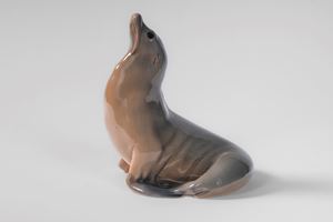 Polychrome porcelain sea lion. Royal Copenhagen, 20th century.