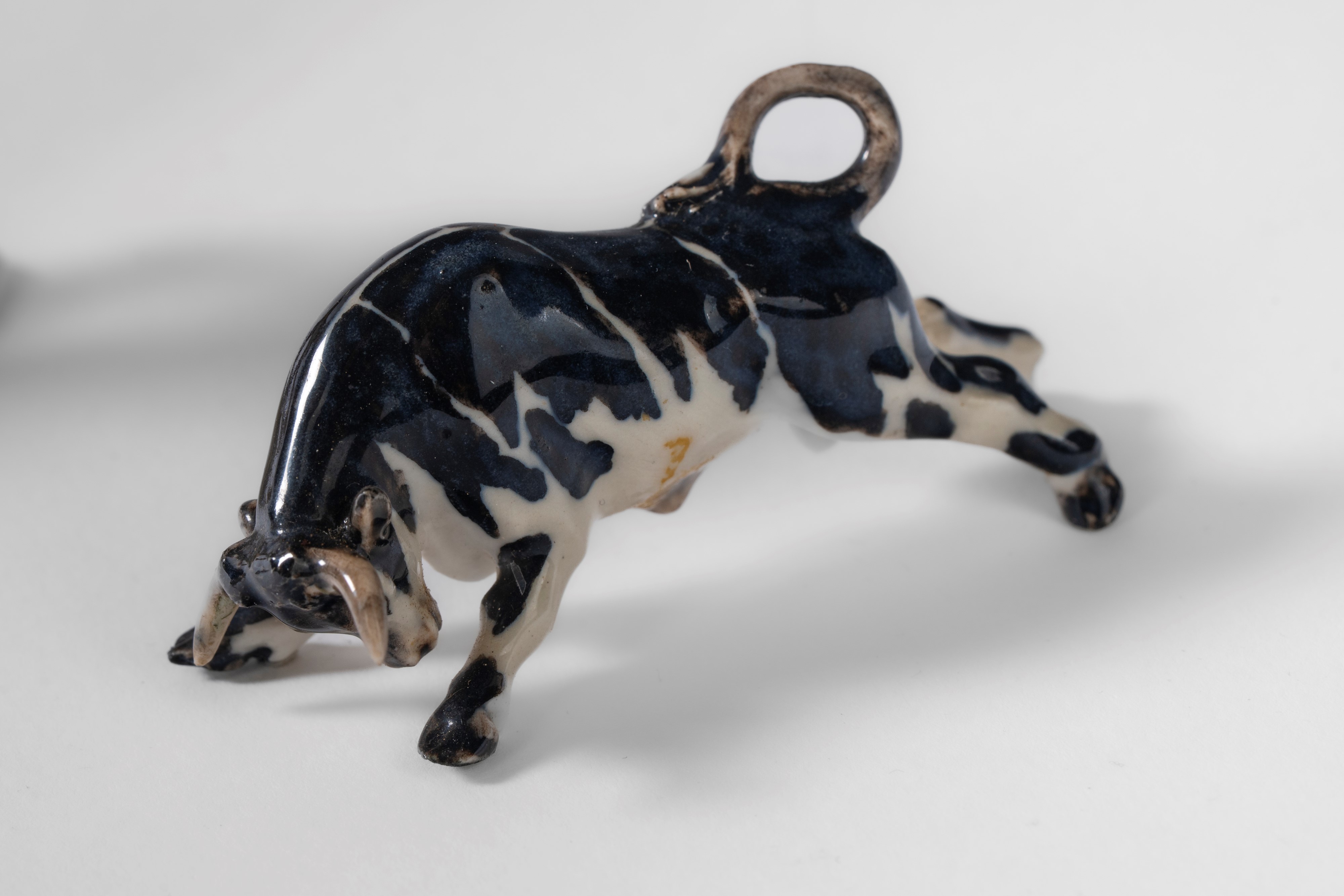 Guido Cacciapuoti - Lotto di sculture in porcellana policroma raffiguranti una giraffa, due tigri...