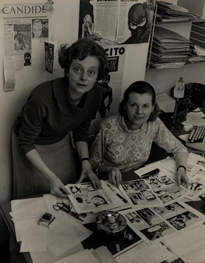 Giussani (studio), Le sorelle Luciana e Angela Giussani nel loro studio dove, aiutate da due assi...