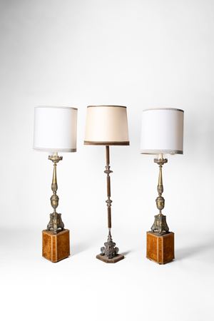 Three metal tripod floor torches