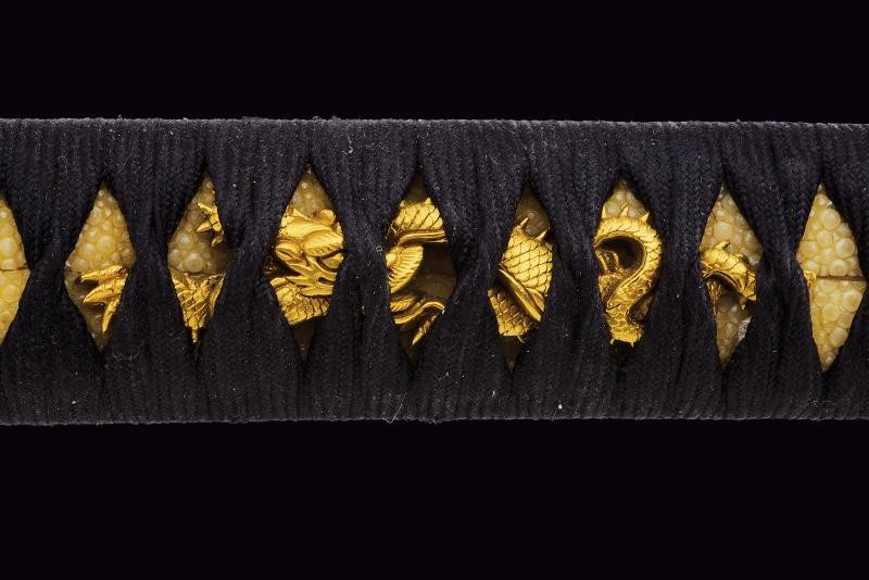 Bel Daisho, con katana recante firma Kanefusa