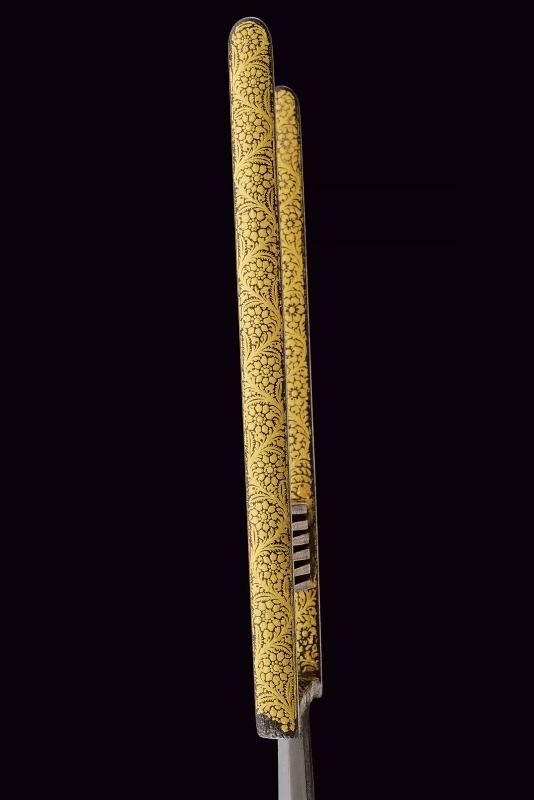Katar indiano, lama damascata con impugnatura in ferro decorata, lunghezza 39 cm