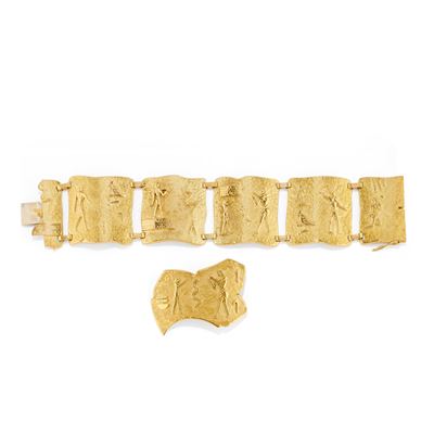 Demi parure egizia in oro giallo 18k, composta da bracciale e spilla
