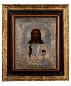 Icon on wood depicting Christ Pantocrator with an embossed and chiseled riza. Russia, late 19th century.
