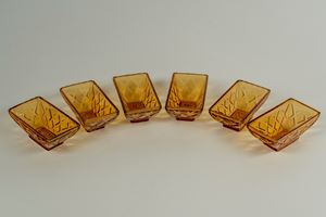 Sei antipastiere in vetro giallo decorato con motivo a losanga