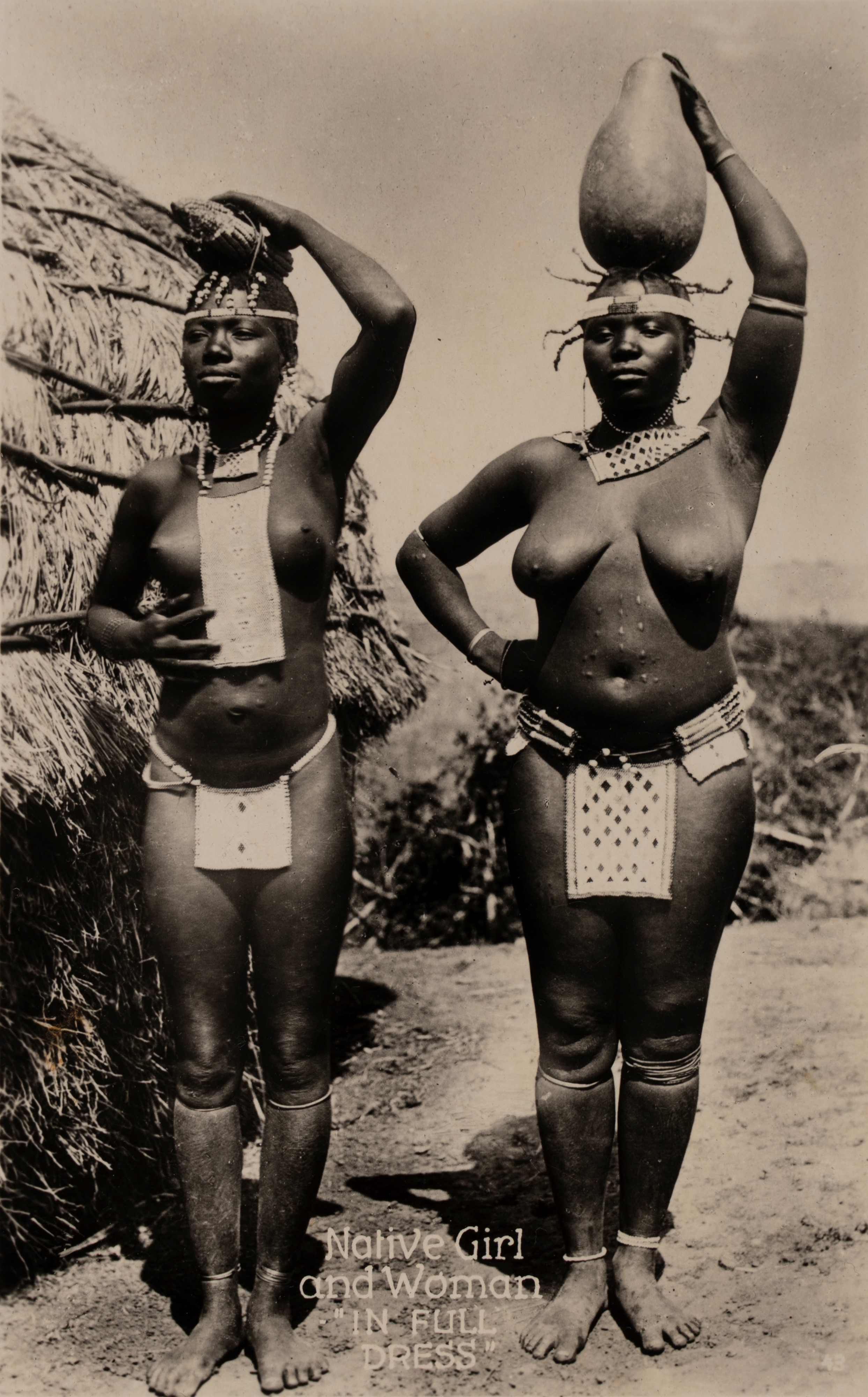 Zululand (Native girl and woman in full dress ; The Real South Africa. Mothers' Pride)