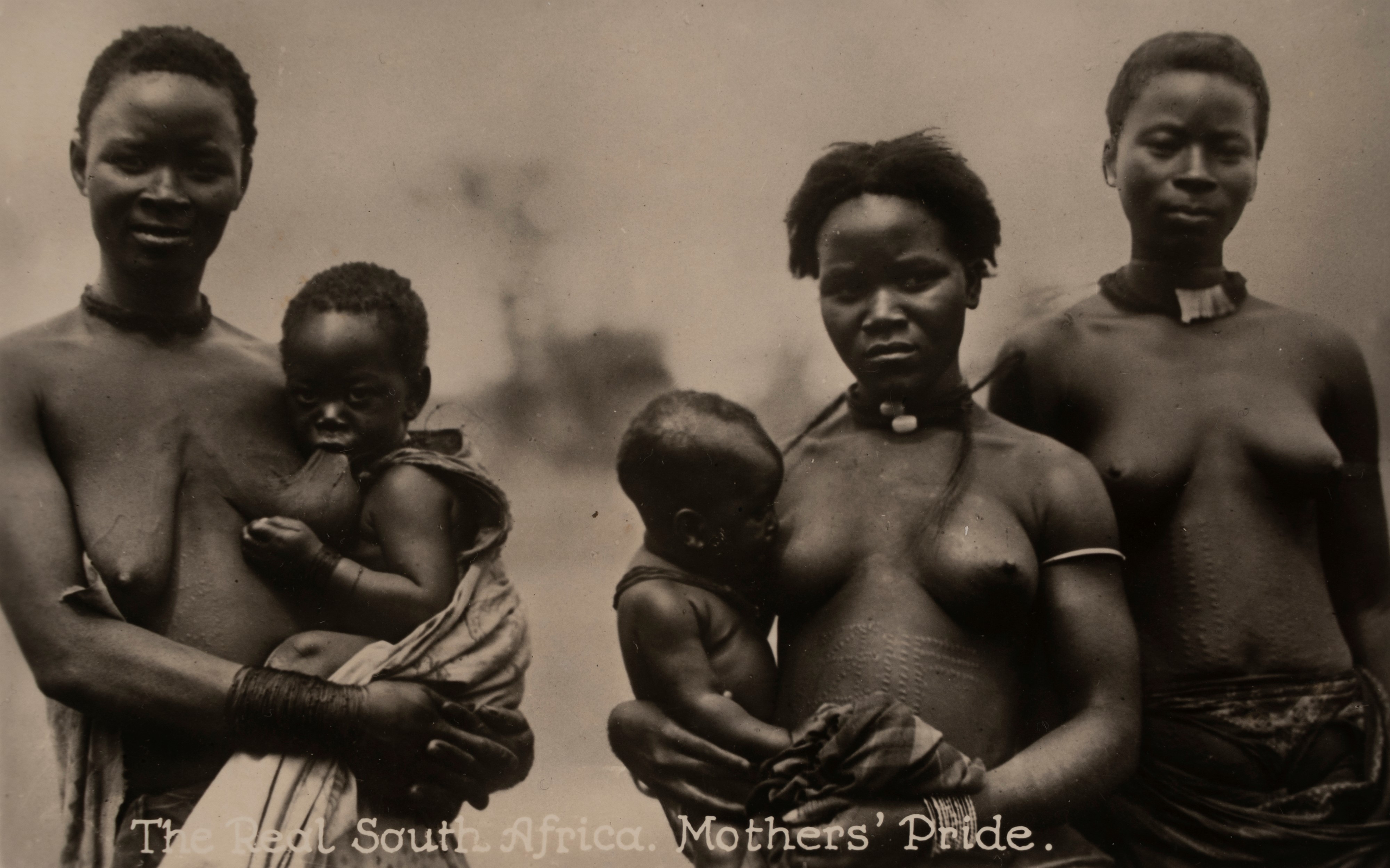 Zululand (Native girl and woman in full dress ; The Real South Africa. Mothers' Pride)